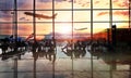Airport terminal at sunset with passengers. Royalty Free Stock Photo
