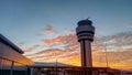 Airport traffic control tower at dramatic sunset in Sofia, Bulgaria