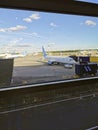 View from the airport waiting room on the planes. Boarding gate area Royalty Free Stock Photo