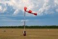 Airport wind sock. Strong wind and bad weather. Climate change. Meteorology forecast Royalty Free Stock Photo