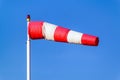 Airport windsock on blue sky background indicate local wind dire Royalty Free Stock Photo