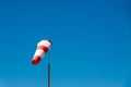 Airport windsock on clear blue sky background Royalty Free Stock Photo