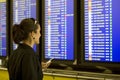 Airport Woman with cellphone Royalty Free Stock Photo