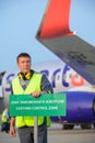 Airport worker customs sign aircraft man male