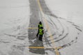 Airport Workers Having a Conversation While Waiting for the Airplane in Bad Winter Weather with a lot of Snow. JFK Airport, New Yo