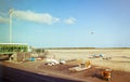 Airport workers receiving luggage and plane taking