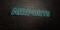 AIRPORTS -Realistic Neon Sign on Brick Wall background - 3D rendered royalty free stock image