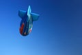 Airship shape hot air balloon with clear blue sky