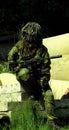 Airsoft boy with m4a1 carbine, camouflage model 95 (vz95) czech republic