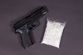 Airsoft pistol with bb bullets Royalty Free Stock Photo