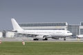 AirTanker Airbus A330-243 with the aircraft registration G-VYGM is starting on the southern runway 8R of the Munich airport MUC Royalty Free Stock Photo