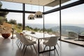 Airy dining room with a minimalist table, stylish chairs, and panoramic views of the surrounding landscape. Generative AI