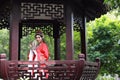 Aisa Chinese woman Peking Beijing Opera Costumes Pavilion garden China traditional role drama play Royalty Free Stock Photo