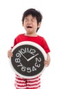 Aisan boy crying and holding clock