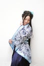 Aisan Chinese woman in traditional Blue and white Hanfu dress
