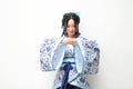 Aisan Chinese woman in traditional Blue and white Hanfu dress