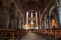 Aisle and wooden pew of Royal Collegiate Church of Roncevaux in Navarre, Spain Royalty Free Stock Photo