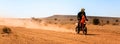 Ait Saoun, Morocco - February 23, 2016: Man riding quad bike in Ait Saoun desert in Morocco Royalty Free Stock Photo