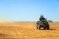 Ait Saoun, Morocco - February 22, 2016: Man riding quad bike on sand Royalty Free Stock Photo