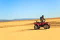 Ait Saoun, Morocco - February 22, 2016: Man riding quad bike on sand Royalty Free Stock Photo