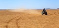 Ait Saoun, Morocco - February 22, 2016: Man riding quad bike on sand Royalty Free Stock Photo