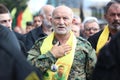 Hezbollah`s young man supporter Carries the flag of Hezbollah Royalty Free Stock Photo