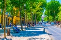 AIX-EN-PROVENCE, FRANCE, JUNE 18, 2017: People are strolling on cours Mirabeau in the center of Aix-en-Provence, France Royalty Free Stock Photo