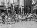 people enjoy a warm summer day by relaxing in an outdoor bar