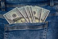 100 dollar bills in the pocket of blue jeans, studio shooting Royalty Free Stock Photo