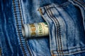 100 dollar bills in the pocket of blue jeans, studio shooting Royalty Free Stock Photo