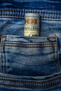 100 dollar bills in the pocket of blue jeans, studio shooting Royalty Free Stock Photo