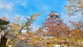 Aizu-Wakamatsu Castle with cherry blossom in Aizuwakamatsu, Japan