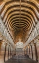 AJANTA, INDIA - FEBRUARY 6, 2017: Chaitya (prayer hall), cave 26, carved into a cliff in Ajanta, Maharasthra state, Ind Royalty Free Stock Photo