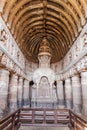 AJANTA, INDIA - FEBRUARY 6, 2017: Interior of the Buddhist chaitya (prayer hall), cave 19, carved into a cliff in Ajanta,