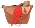 Ajar leather bag with bra and pink lace panties Royalty Free Stock Photo