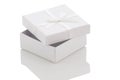 Ajar white gift box on a white background