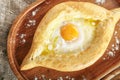 Ajarian Khachapuri with Cheese and Raw Egg