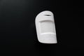 Ajax. motion sensor on black. device that tracks movement of objects. Royalty Free Stock Photo