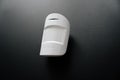 Ajax. motion sensor on black. device that tracks movement of objects. Royalty Free Stock Photo
