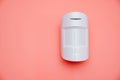 Ajax. motion sensor on pink. device that tracks movement of objects. Royalty Free Stock Photo