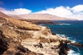 Ajuy coastline with vulcanic mountains on Fuerteventura island, Canary Islands, Spain. Royalty Free Stock Photo