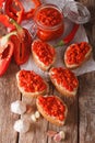 Ajvar - delicious dish of red peppers, onions and garlic closeup