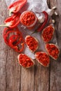 Ajvar - delicious dish of red peppers, onions and garlic closeup