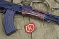 AK47 with Soviet Army Commandant shoulder patch on khaki uniform