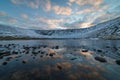 Akademicheskoye Lake in Khibiny Mountains at Sunset in Winter and Reflection. Russia Royalty Free Stock Photo