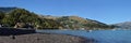 Akaroa Beach & Town Panorama, New Zealand Royalty Free Stock Photo