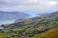 Akaroa Harbor lake and hills in New Zealand Royalty Free Stock Photo