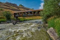 AKHALKALAKI, GEORGIA - 06 AUGUST 2017: bridge made from old abandoned train car Royalty Free Stock Photo