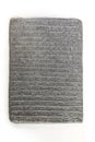 Akkad empire style cuneiform written in gray clay on white background