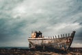 Akranes, Iceland - May 2018: View towards Old rusty boat and shipreck.